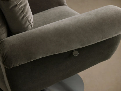 Close-up of the plush, dark grey-green upholstery on the back and armrest of the Deacon Swivel Recliner, showing its channeled cushioning.