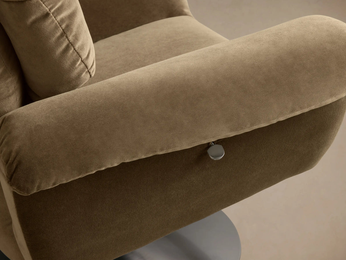 Front view of the brown Deacon Swivel Recliner with plush upholstery, segmented back, rolled arms, and a silver swivel base.