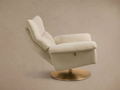 Rear-side view of a plush beige Deacon Swivel Recliner with a gold-toned round swivel base.