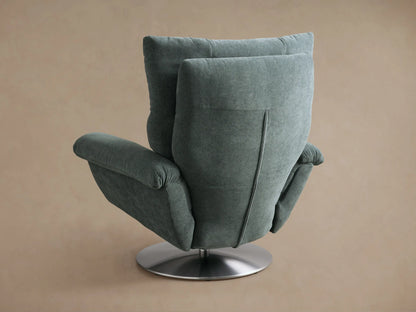 Close-up of the muted teal woven fabric armrest on the Deacon Swivel Recliner, revealing a small silver side lever.