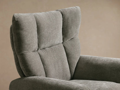 Front view of a grey Deacon Swivel Recliner with a circular brushed silver base, plush tufted fabric, and rolled arms.