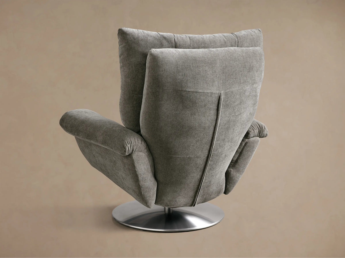 Close-up of the grey Deacon Swivel Recliner, showing the textured armrest with a silver reclining lever.
