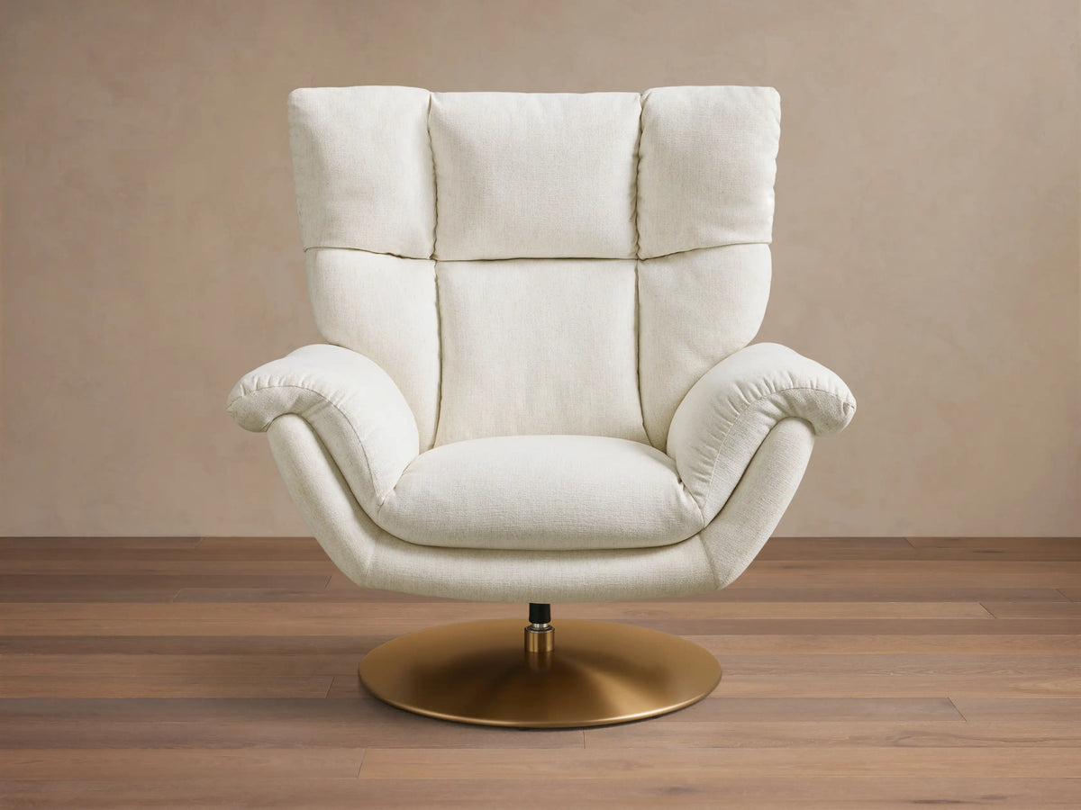 Close-up of the cream Deacon Swivel Recliner, showing its channeled backrest, woven upholstery, and plush armrest.