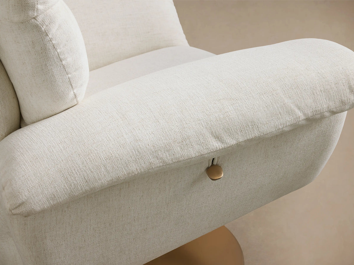 Front view of the Cream Deacon Swivel Recliner, with plush, channel-tufted backrest, rolled arms, and a round gold swivel base.