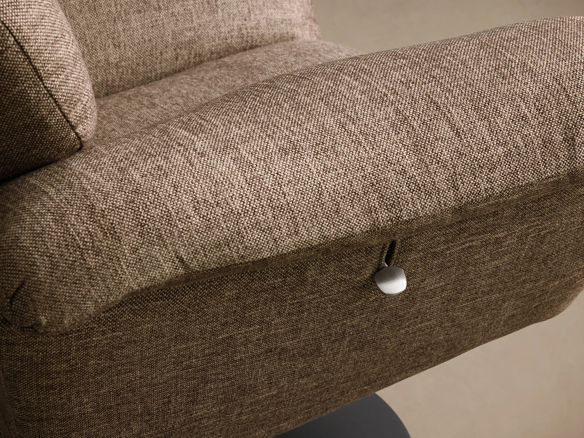 Front view of the brown Deacon Swivel Recliner with a tufted back, rolled arms, side lever, and black circular base.