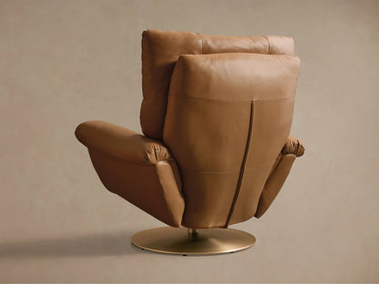 Close-up of the tan leather armrest and padded back of the Deacon Leather Swivel Recliner, showing detailed stitching.