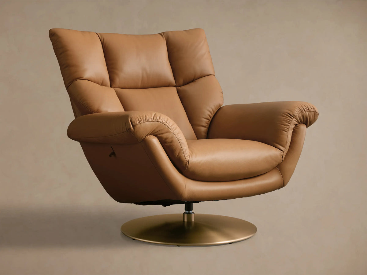 Rear view of a tan leather Deacon Leather Swivel Recliner with a gold swivel base.
