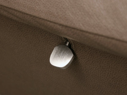 Front view of the brown Deacon Leather Swivel Recliner, with horizontal padded sections and a shiny silver swivel base.