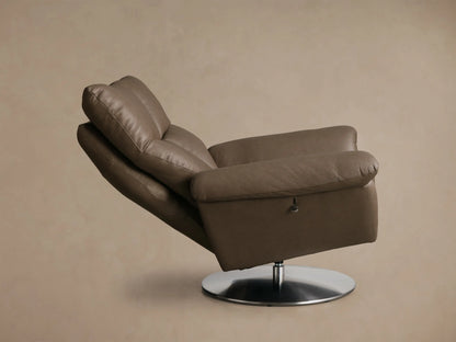 Angled front view of a mushroom brown Deacon Leather Swivel Recliner with plush channeled back and polished silver swivel base.