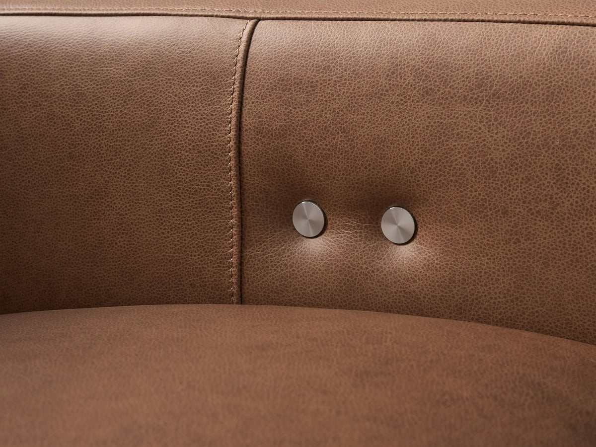 Rowland Tailored Leather Three-Piece Motion Modular Sofa, warm tan leather, front view on a light wood floor.