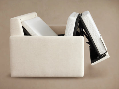Kipton Luxury Sleeper Sofa shown extended, featuring a quilted white mattress partially pulled out from the cream-colored sofa frame.