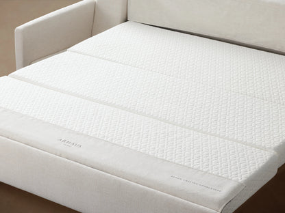 Kipton Luxury Sleeper Sofa in light beige fabric, featuring a sleek, modern design with straight arms and plush cushions.