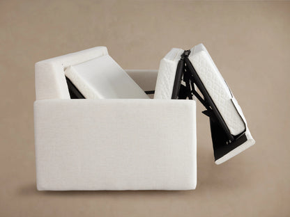 Kipton Luxury Sleeper Sofa in an open position showing a plush, white, quilted mattress extending from the sofa frame.