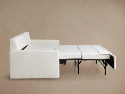 Back view of the Kipton Luxury Sleeper Sofa in cream fabric, showcasing smooth upholstery and sturdy frame against a neutral background.