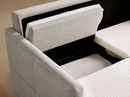 Reece Sleeper Sofa open, showcasing a white quilted mattress with quilted pattern, framed by gray upholstered sections.