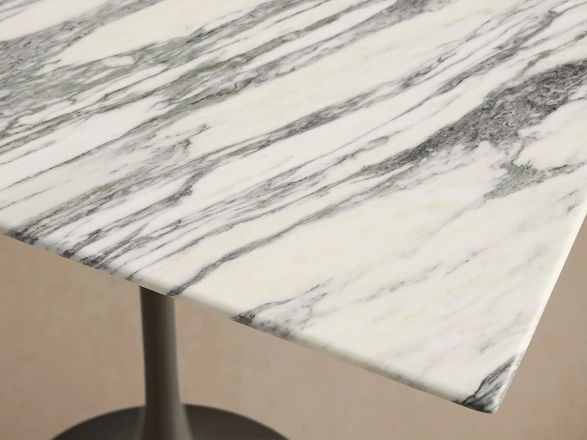 Front view of the Saint Germain Square Counter Table featuring a white marble top with grey veining and a dark bronze steel pedestal base.