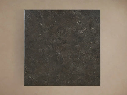 Front view of the Saint Germain Square Counter Table featuring a dark gray square stone top and a golden flared steel base.