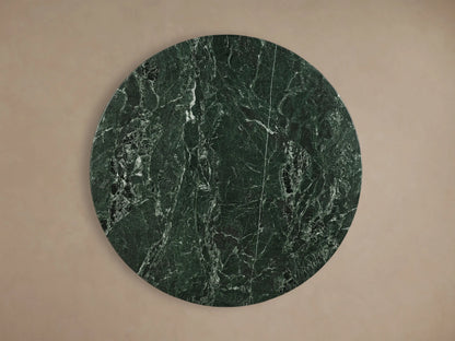 Front view of the Saint Germain Round Stone Dining Table with Dauphine Base, featuring a green stone top and a gray oak veneer base.