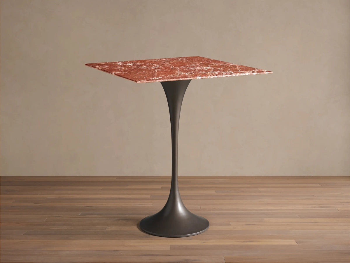 Front view of the Saint Germain Square Counter Table featuring a reddish-brown square marble top with white veining on a dark steel flared base.