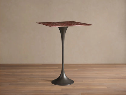Front view of Saint Germain Square Bar Table with a red marble top and a dark tapered steel pedestal base.