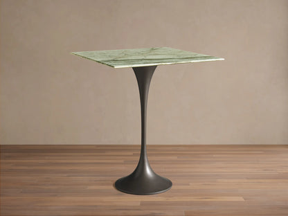Front view of the Saint Germain Square Counter Table with a green veined marble top and a dark flared steel pedestal base.