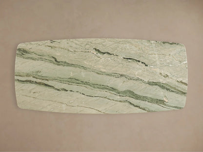 Front view of the Saint Germain Stone Dining Table with Toulouse Base, featuring a green veined stone top and a dark block base.
