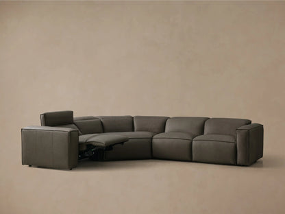 Front view of the charcoal gray Coburn Motion Leather Four-Piece Corner Wedge Sectional with the left arm recliner extended.