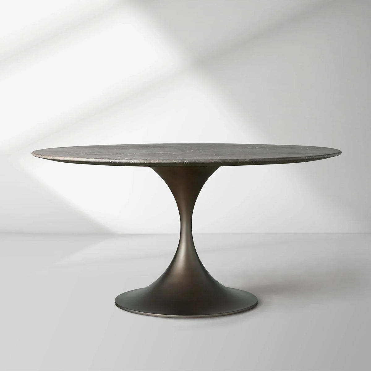 Saint Germain Round Stone Dining Table with Modern Steel Base