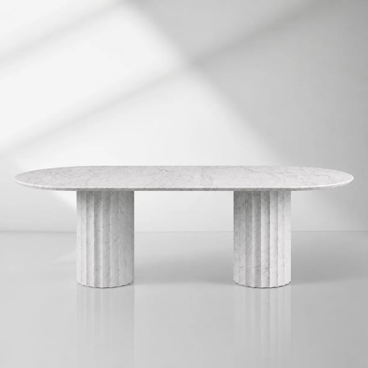 Danae Oval Marble Dining Table with Fluted Pedestal Base