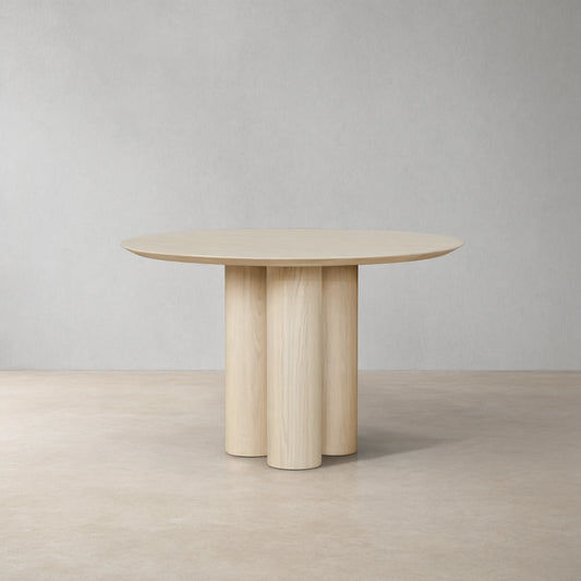 Reade Natural Ash Wood Round Dining Table with Sculptural Columnar Legs