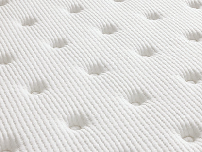 Premium firm mattress on a light wood frame, featuring a quilted white cotton cover with a subtle patterned design against a beige background.