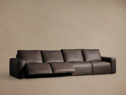 Close-up of the Brennan Leather Sectional's textured brown leather upholstery with two black oval power recline control buttons.