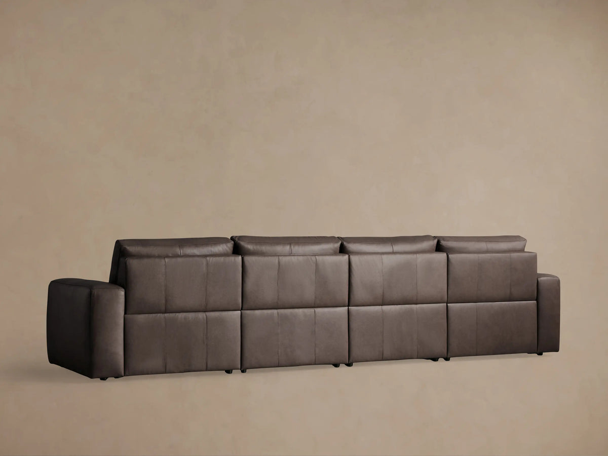 Dark brown Brennan leather 4-piece motion sectional sofa, two right seats reclined with footrests extended.