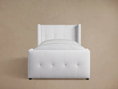 Wyller Box-Tufted Twin Bed, light cream fabric, box-tufted headboard with wingback sides & footboard, white bedding.