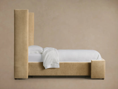 Close-up of Wyller Channel-Stitched Twin Bed headboard, featuring plush, vertically channel-stitched taupe fabric.