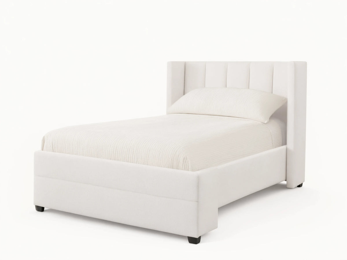 Wyller Channel-Stitched Twin Bed, light beige upholstered bed with vertical channel stitching on headboard, on wood floor.