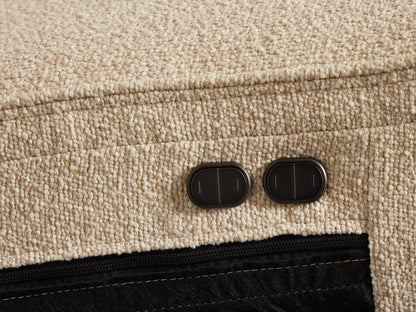 Front view of a cream Borough Two-Piece Motion Sofa, featuring two seats, horizontal tufting on backrests, and upholstered armrests.