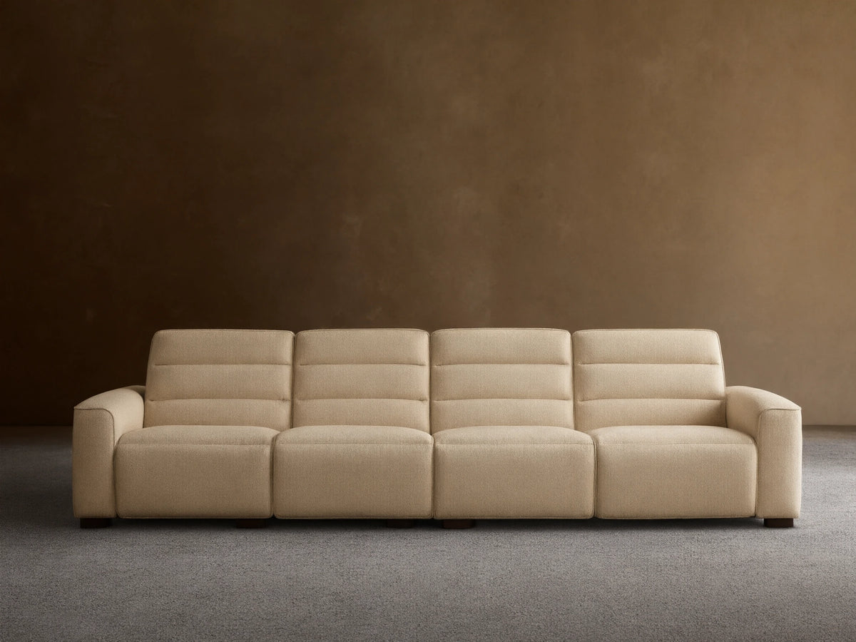 Front view of the cream Borough Four-Piece Motion Sectional with horizontally stitched backrests.
