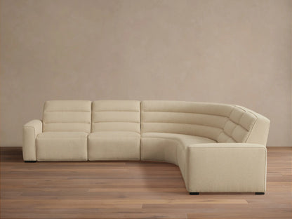 Front view of a cream Borough Five-Piece Motion Corner Sectional with horizontal ribbed recliners and a curved tufted corner.