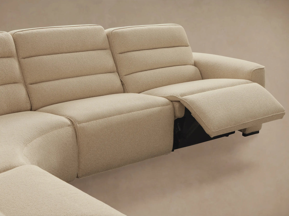 Front view of the cream Borough Five-Piece Motion Corner Sectional‚Ñ¢ with horizontal channel tufting.