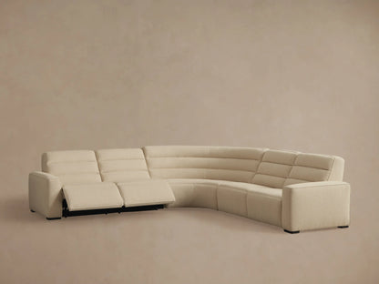 Rear view of the cream Borough Five-Piece Motion Corner Sectional, showing its curved shape and segmented back.