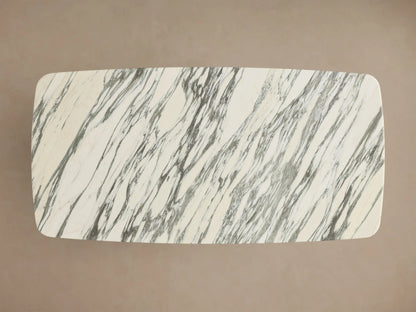 Front view of the Saint Germain Stone Coffee Table with a white and gray marbled top and two dark brown oak veneer Dauphine bases.