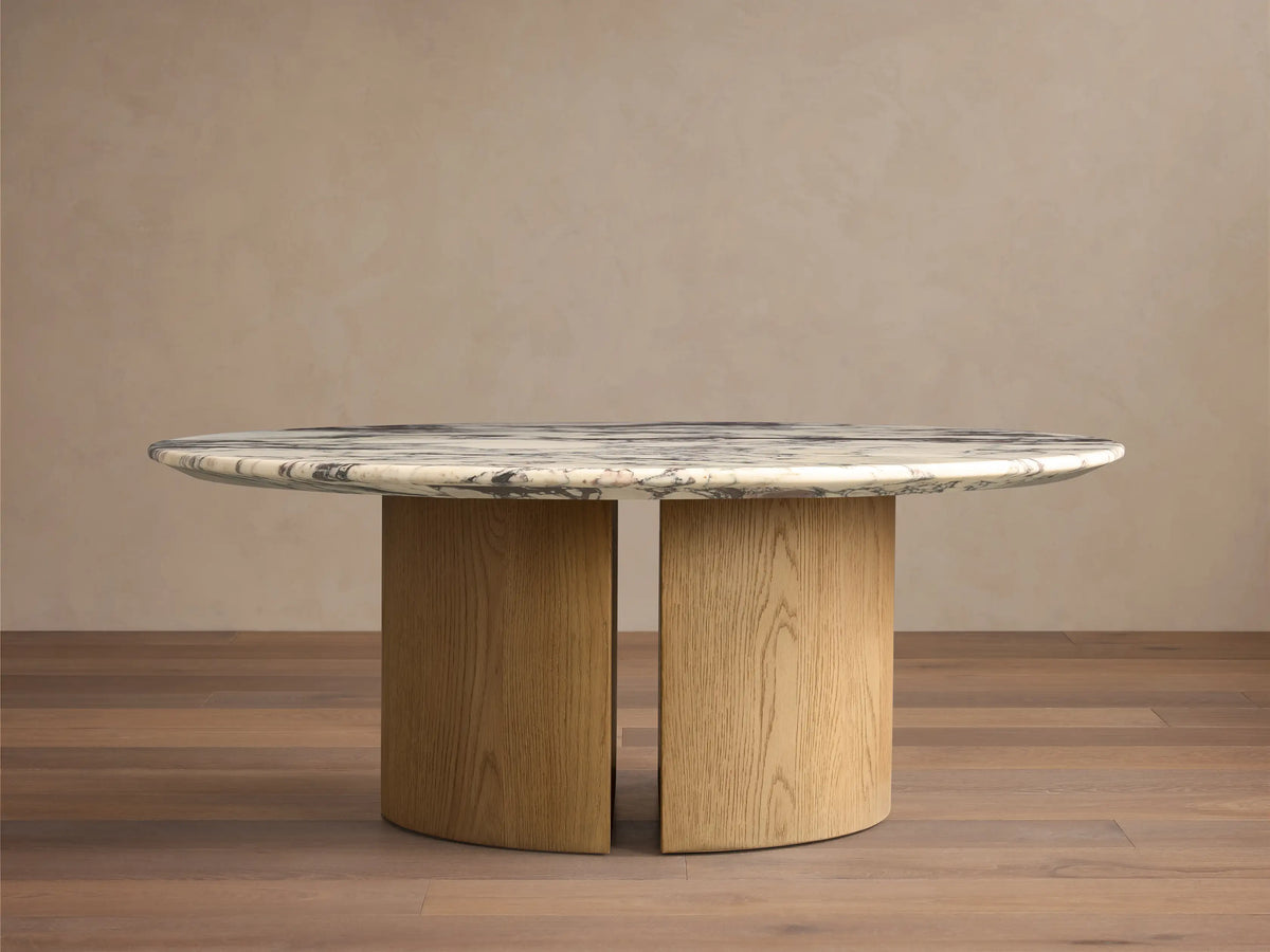 Saint Germain Round Stone Coffee Table with Dauphine Base