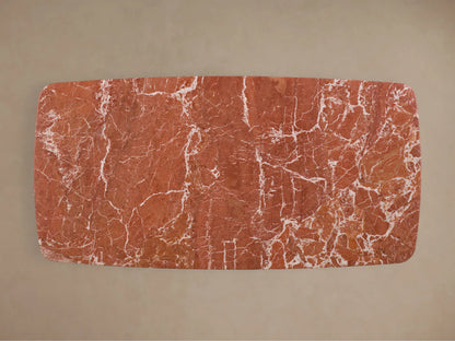 Front view of the Saint Germain Stone Coffee Table with Dauphine Base, featuring a red stone tabletop with white veining, on two light oak Dauphine bases.