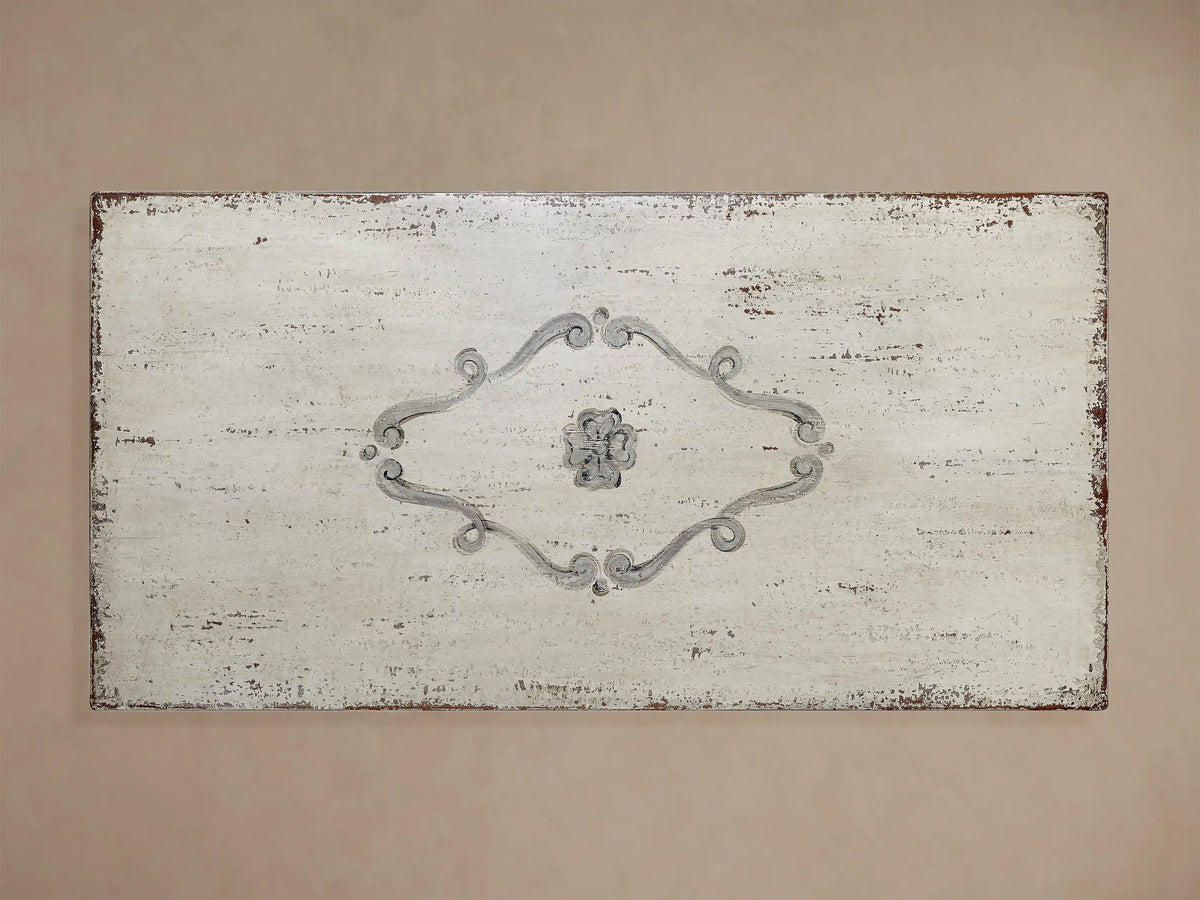Biancca Bell'Arte rectangular dining table with distressed Antique White top, Antique Grey floral scroll, and pedestal base.