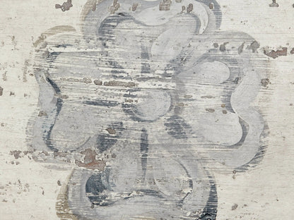 Top of Biancca Bell‚ÄôArte Dining Table: distressed Antique White surface with a central Antique Grey floral and scroll design.