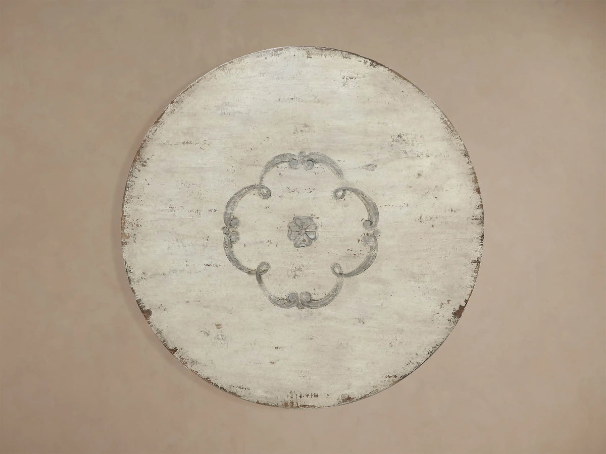 Biancca Bell‚ÄôArte Round Dining Table, distressed antique white top with grey floral scroll, antique grey pedestal base.