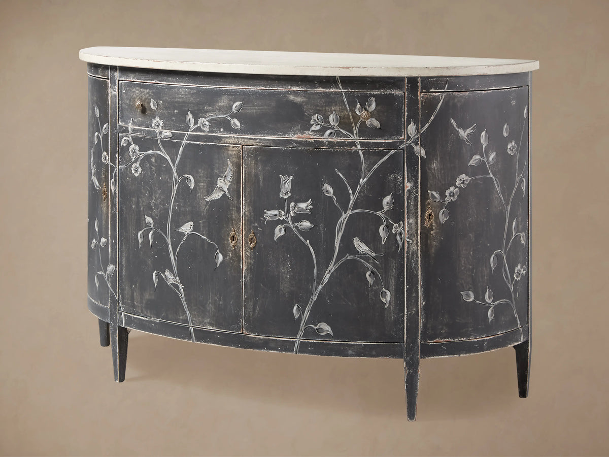 Sofia Bell'Arte Demilune Cabinet in dark finish with hand-painted white bird and floral motifs, featuring a gently distressed, antique look.