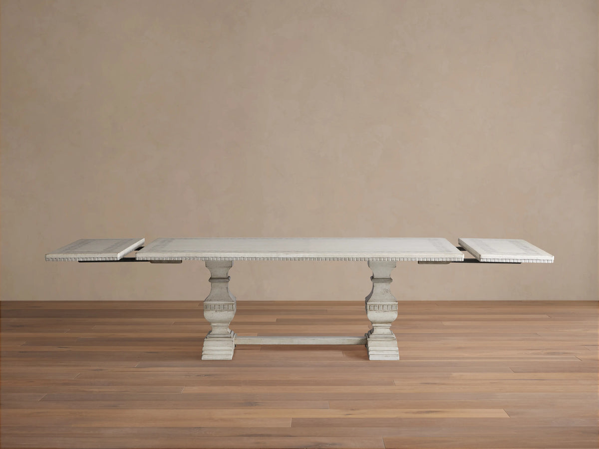 Cerea Margherita Bell'Arte Dining Table, distressed off-white, rectangular top with hand-painted diamond border, pedestal bases.