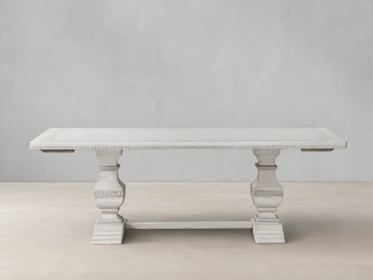 Cerea Margherita Bell'Arte Dining Table, distressed off-white, rectangular top with hand-painted diamond border, pedestal bases.